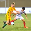 U19 Việt Nam (áo trắng) bại trận trước U19 Australia. (Nguồn: Minh Đức/TTXVN)