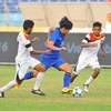U19 Thái Lan (áo xanh) vượt qua U19 Timor Leste để giành vé vào chung kết. (Ảnh: Minh Đức/TTXVN)