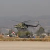 Máy bay trực thăng tại căn cứ quân sự Nga. (Ảnh: AFP/TTXVN)