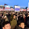 Người dân Triều Tiên tuần hành tại Quảng trường Kim Nhật Thành. (Nguồn: AFP)