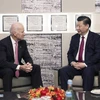Chủ tịch Trung Quốc Tập Cận Bình và Phó Tổng thống Mỹ Joe Biden gặpp mặt tạ Davos, Thụy Sĩ. (Nguồn: Xinhua)