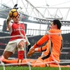 Sanchez ghi bàn bằng tay giúp Arsenal giành chiến thắng. (Nguồn: Getty Images)