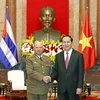 Chủ tịch nước Trần Đại Quang tiếp đồng chí Leopoldo Cintra Frísas, Bộ trưởng Bộ các Lực lượng vũ trang cách mạng Cuba. (Ảnh: Nhan Sáng/TTXVN)