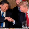 Tổng thống Mỹ Trump (phải) trong cuộc gặp Chủ tịch Trung Quốc Tập Cận Bình. (Nguồn: AFP/Getty Images)