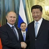 Tổng thống Nga Putin và Chủ tịch Trung Quốc Tập Cận Bình. (Nguồn: AP)