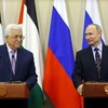 Tổng thống Putin và người đồng cấp Palestine Mahmoud Abbas. (Nguồn: AFP)