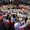 Người dân tưởng nhớ các nạn nhân xấu số sau vụ tấn công. (Nguồn: Getty Images)