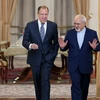 Ngoại trưởng Nga Sergei Lavrov và người đồng cấp Iran Mohammad Javad Zarif. (Nguồn: AP)