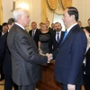 Chủ tịch nước Trần Đại Quang gặp Thống đốc thành phố Saint Peterburg Po​ntavchenko. (Ảnh: Nhan Sáng​/TTXVN)