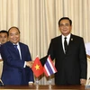 Thủ tướng Nguyễn Xuân Phúc và Thủ tướng Thái Lan Prayut Chan-o-cha. (Ảnh: Thống Nhất/TTXVN)