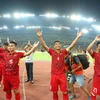 Niềm vui của các cầu thủ Việt Nam sau chiến thắng. (Ảnh: Quốc Khánh/TTXVN)