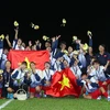 Tuyển bóng đá nữ giành HCV SEA Games 29. (Ảnh: Quốc Khánh/TTXVN)