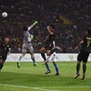 Thủ môn U22 Malaysia đấm bóng về lưới nhà giúp U22 Thái Lan giành chiến thắng.