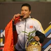 VĐV Nguyễn Văn Trí giành huy chương vàng ở nội dung đối kháng hạng cân 90kg nam. (Ảnh: Quốc Khánh/TTXVN)