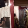 Cô gái rơi vào tình cảnh trớ trêu và được nhân viên cứu hỏa... giải cứu. (Nguồn: straitstimes.com)