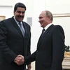 Tổng thống Venezuela Nicolas Maduro và người đồng cấp nước chủ nhà Vladimir Putin. (Nguồn: Reuters)