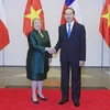Chủ tịch nước Trần Đại Quang tổ chức Quốc yến chiêu đãi trọng thể Tổng thống Michelle Bachelet Jeria cùng các thành viên trong Đoàn đại biểu cấp cao Cộng hòa Chile thăm cấp Nhà nước tới Việt Nam. (Ảnh: Nhan Sáng/TTXVN)