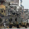 Binh sỹ Philippines tuần tra tại Marawi sau khi thành phố này được giải phóng. (Nguồn: THX/TTXVN)