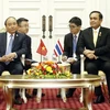 Thủ tướng Nguyễn Xuân Phúc và Thủ tướng Thái Lan Prayuth Chan-ocha. (Ảnh: Thống Nhất/TTXVN)