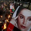 Người dân tưởng nhớ cựu Thủ tướng Pakistan Benazir Bhutto. (Nguồn: outlookindia)