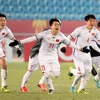 Niềm vui của U23 Việt Nam sau loạt sút luân lưu ở trận thắng U23 Qatar. (Ảnh: Hoàng Linh/TTXVN)