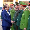 Thủ tướng Chính phủ Nguyễn Xuân Phúc đến thăm, chúc Tết các lực lượng vũ trang thành phố Đà Nẵng. (Ảnh: Trần Lê Lâm/TTXVN)