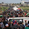 Người dân Palestine tuần hành gần biên giới Gaza-Israel. (Nguồn: AFP)