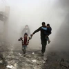 Các dân thường Syria chạy trốn các cuộc không kích. (Nguồn: AFP/Getty Images)