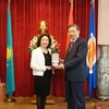 Bộ trưởng Tô Lâm và Đại sứ Việt Nam tại Kazakhstan Đoàn Thị Xuân Hiền. (Ảnh: Lê Quang Vinh/TTXVN)