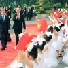 Thiếu nhi thủ đô Hà Nội vẫy cờ hai nước chào mừng Tổng thống Hàn Quốc Moon Jae-in và Phu nhân sang thăm Việt Nam hồi cuối tháng 3/2018. (Ảnh: Nhan Sáng/TTXVN)