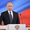 Tổng thống Vladimir Putin đọc lời tuyên thệ nhậm chức tại điện Kremlin ngày 7/5. (Nguồn: AFP/TTXVN)