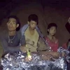 Các thành viên đội bóng thiếu niên mắc kẹt bên trong hang Tham Luang. (Nguồn: THX/TTXVN)