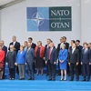 Lãnh đạo các nước thành viên NATO chụp ảnh chung tại hội nghị thượng đỉnh NATO ngày 11/7. (Nguồn: AFP/TTXVN)
