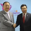 Phó Thủ tướng, Bộ trưởng Ngoại giao Phạm Bình Minh và Bộ trưởng Ngoại giao Triều Tiên Ri Yong Ho. (Ảnh: Xuân Vịnh/TTXVN)