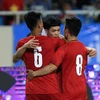 Các cầu thủ Việt Nam ăn mừng bán thắng ấn định tỷ sồ của Công Phượng. (Ảnh: Trọng Đạt/TTXVN)