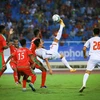 U23 Việt Nam (áp trắng) đánh bại U23 Oman. (Ảnh: Trọng Đạt/TTXVN)