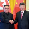 Chủ tịch Trung Quốc Tập Cận Bình và Nhà lãnh đạo Triều Tiên Kim Jong-un trong cuộc gặp gần đây. (Nguồn: AFP)
