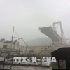 Hiện trường vụ sập cầu cạn tại Genoa, Italy ngày 14/8. (Ảnh: THX/TTXVN)
