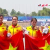 Đội tuyển rowing nữ giành HCV đầu tiên cho đoàn thể thao Việt Nam. (Ảnh: TTXVN phát)