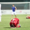 Cầu thủ Syria thất vọng sau khi để thua Olympic Việt Nam. (Ảnh: Hoàng Linh/TTXVN)