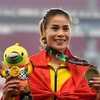 Vũ Thị Mến giành Huy chương đồng ở nội dung nhảy ba bước nữ. (Ảnh: AFP/TTXVN)