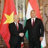 Thủ tướng Hungary Viktor Orbán đón Tổng Bí thư Nguyễn Phú Trọng. (Ảnh: Trí Dũng/TTXVN)