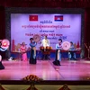 Tiết mục múa 'Những cô gái Quan họ' của các nghệ sỹ Việt Nam trong chương trình. (Ảnh: TTXVN)