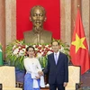 Chủ tịch nước Trần Đại Quang tiếp Cố vấn Nhà nước Myanmar Aung San Suu Kyi. (Ảnh: Nhan Sáng/TTXVN)