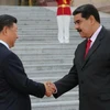 Tổng thống Venezuela Nicolás Maduro (phải) và Chủ tịch Trung Quốc Tập Cận Bình. (Nguồn: AFP)