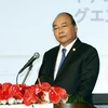 Thủ tướng Nguyễn Xuân Phúc phát biểu tại Diễn đàn Xúc tiến đầu tư Việt Nam. (Ảnh: Thống Nhất/TTXVN)