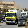 Đoàn xe viện trợ nhân đạo tới Syria. (Nguồn: THX/TTXVN)