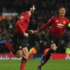 Fellaini (trái) ghi bàn đưa Manchester United vào vòng 1/8. (Nguồn: Reuters)
