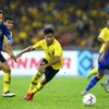 Malaysia (áo vàng) liệu có gây sốc trước Thái Lan. (Nguồn: Fox Sports)