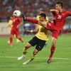 Việt Nam hay Malaysia sẽ đăng quang AFF Suzuki Cup 2018? (Ảnh: Trọng Đạt/TTXVN)